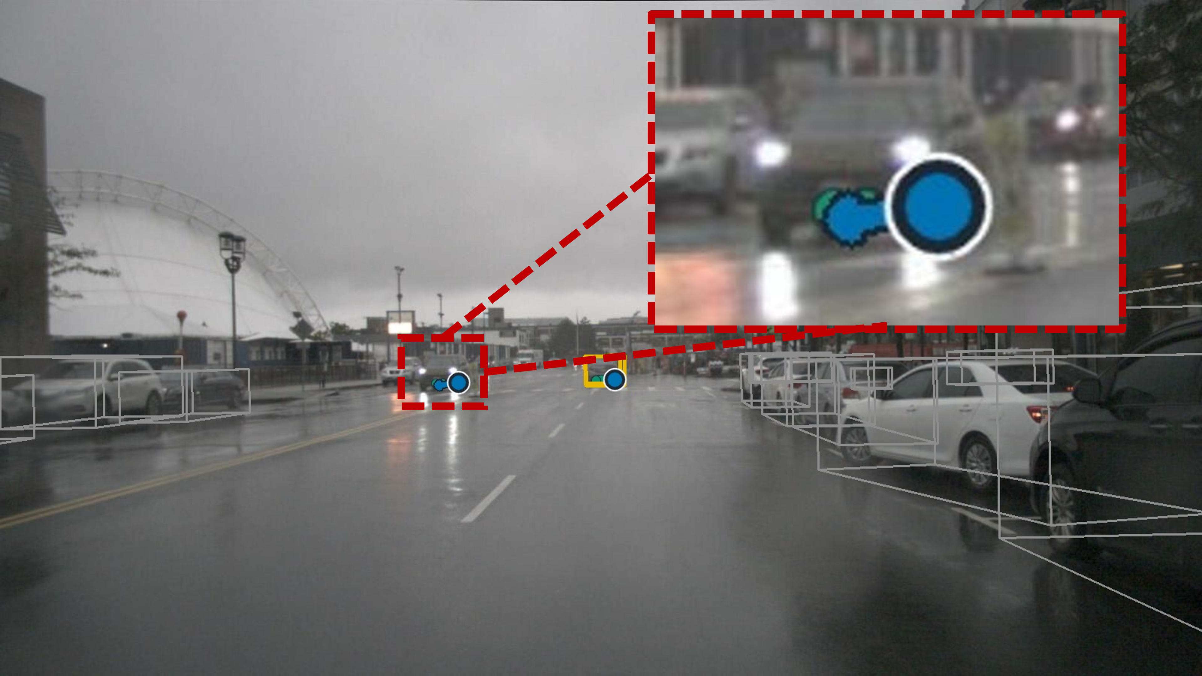 Unannotated oncoming vehicle in rain detected by PART.